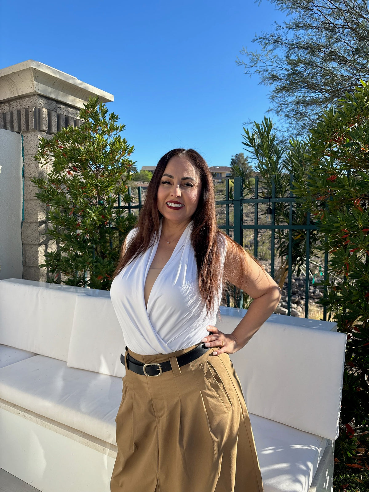 Model wearing the Eleanor utility midi skirt with cargo-style pockets and a high-waisted fit.