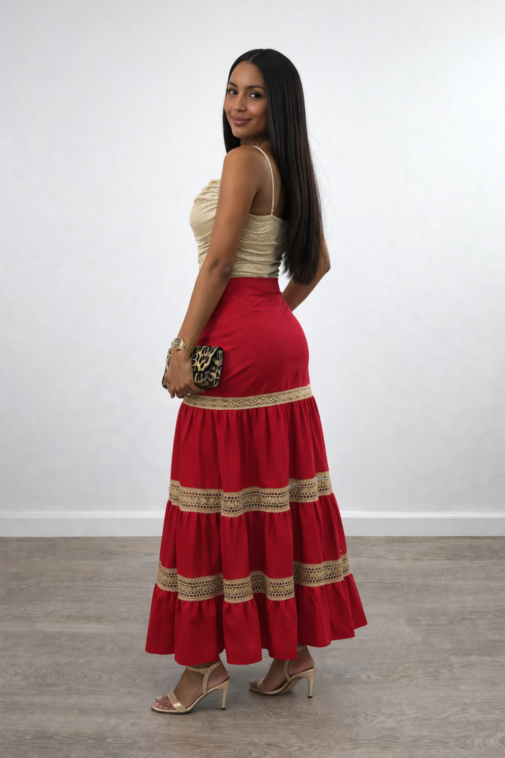 Shop this red maxi skirt featuring a high waist, flowy tiered design, and delicate lace trim. A chic boho skirt for day-to-night wear.